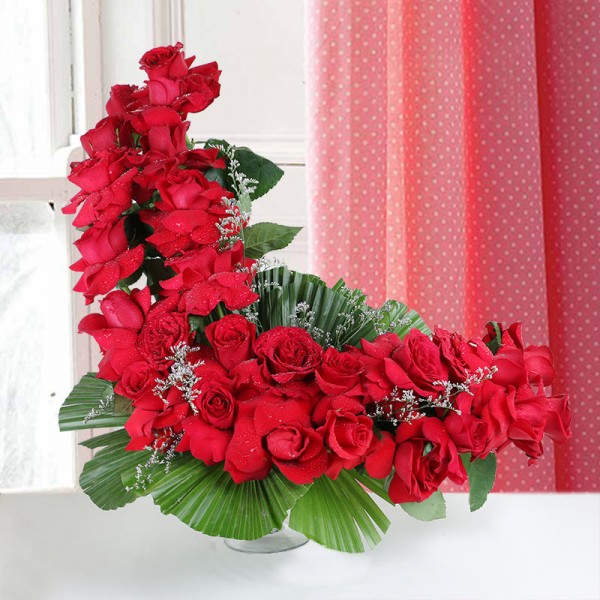 25 Red Roses in glass vase